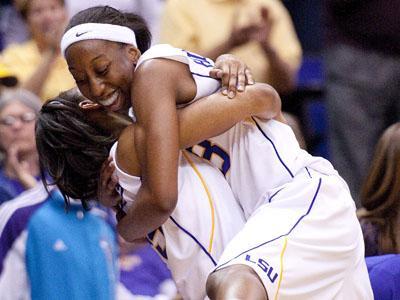 Senior guard Allison Hightower celebrates her senior game with teammate Katherine Graham on Sunday.