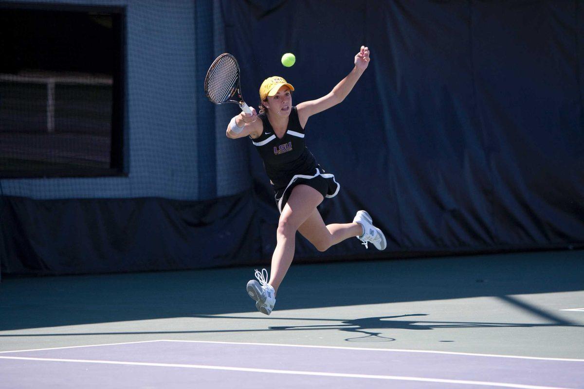 LSU freshman Kaitlin Burns returns a ball Sunday during a doubles match against Ole Miss. LSU defeated Ole Miss, 6-1.