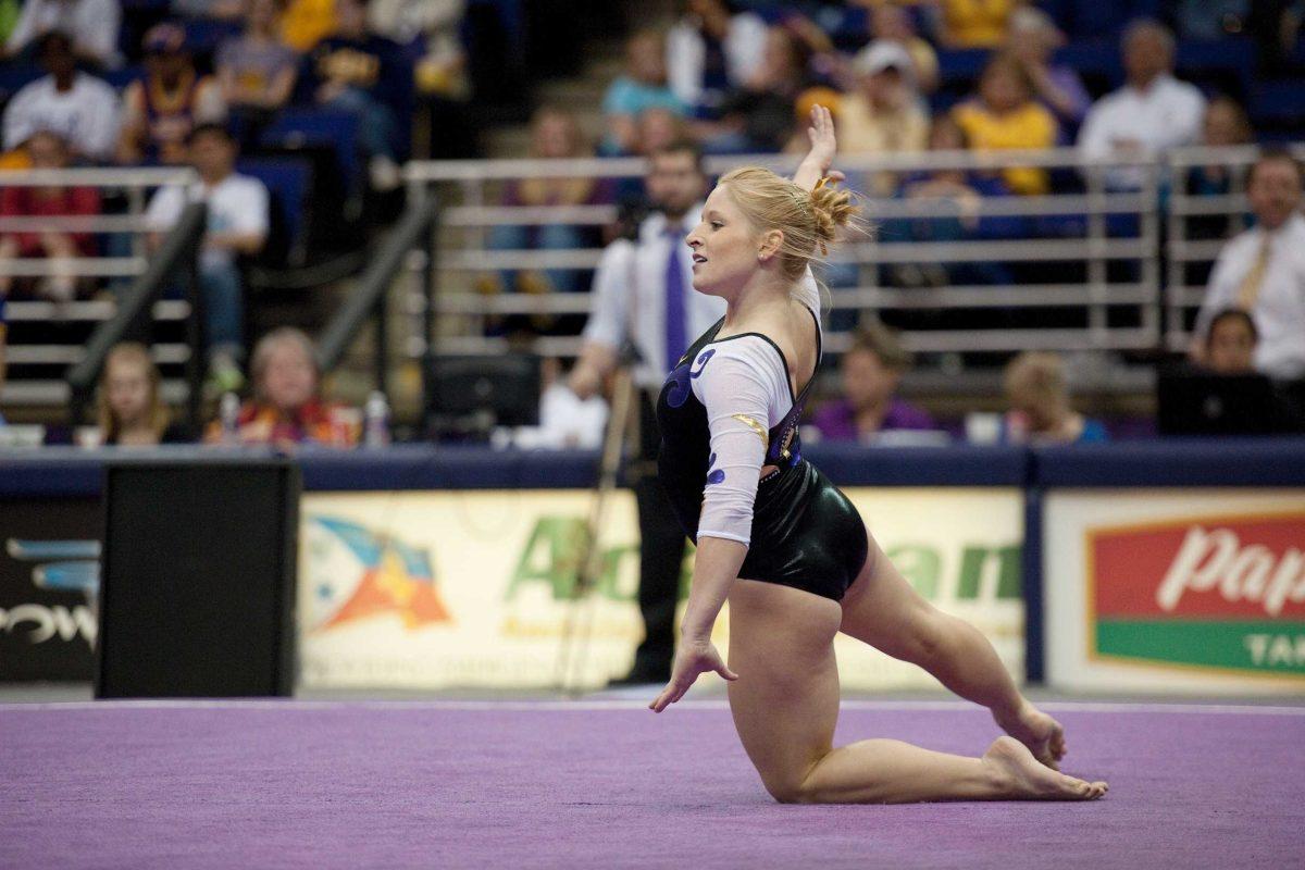 LSU senior Susan Jackson performs a floor routine during Friday&#8217;s meet against Iowa. The Tigers won 197-195.