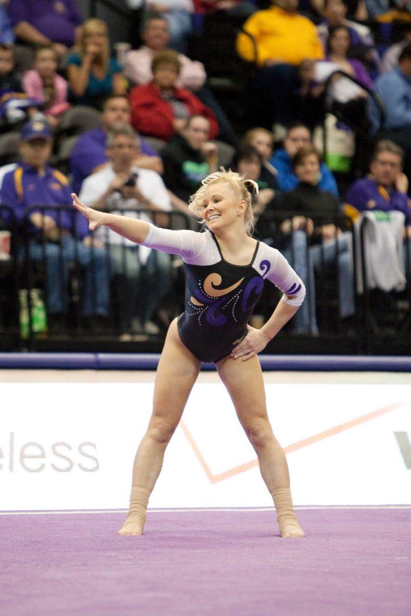 LSU senior Summer Hubbard poses March 13 during a routine in the meet against Iowa in the PMAC.