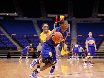 LSU senior guard Allison Hightower moves down the court during practice at the PMAC on Wednesday. Hightower is the only senior on the LSU women&#8217;s basketball team and leads the Lady Tigers in scoring with 18.5 points per game.