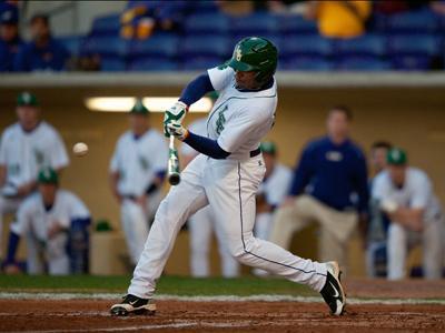 LSU junior outfielder Leon Landry hits a home run during the second inning of the Tigers&#8217; 10-3 victory against Nicholls on Wednesday at Alex Box Stadium. Landry went 2-3 at bat against the Colonels.