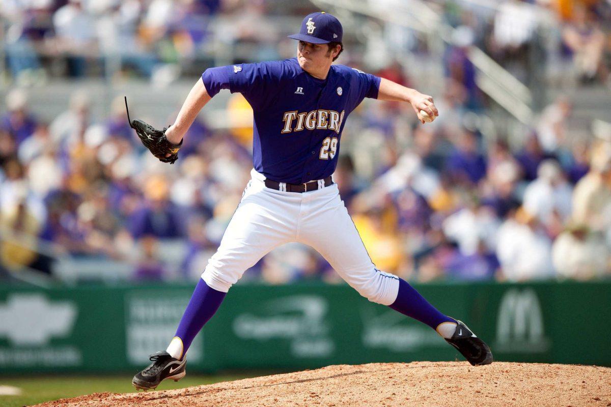 <p>LSU freshman pitcher Jordan Rittiner throws a pitch during the Tigers’ 9-2 victory against Brown on March 7 in Alex Box Stadium.</p>