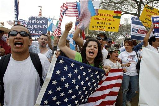 Demonstrators march at the National Mall during a rally for immigration reform in Washington, on Sunday, March 21, 2010.