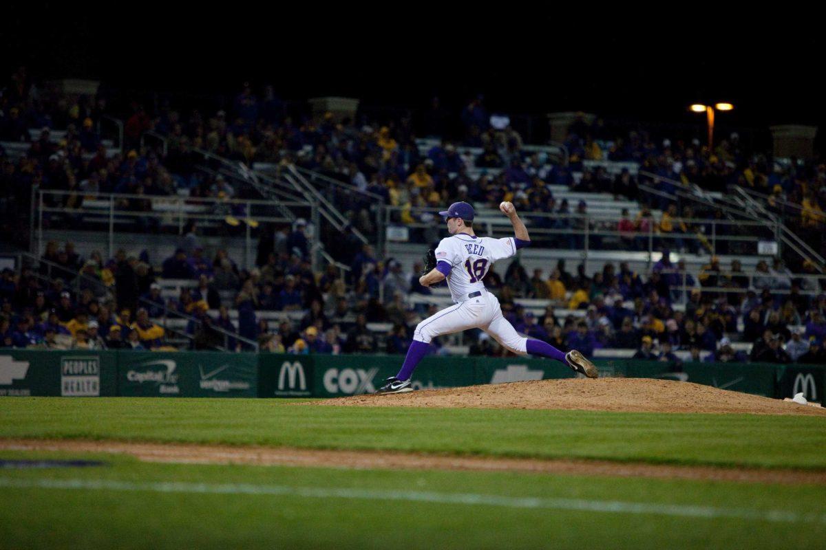 LSU freshman pitcher Michael Reed throws a pitch Feb. 20 against Cententary. Reed will get his first start against Louisiana-Monroe tonight for the Tigers&#8217; fifth game in six days.