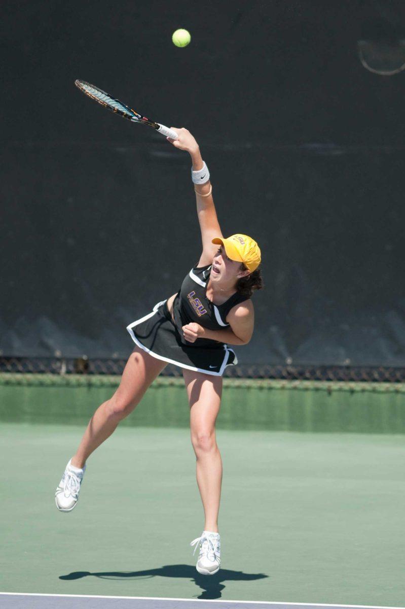 LSU freshman Kaitlin Burns serves the ball Sunday during a doubles match against Ole Miss at W. T. &#8220;Dub&#8221; Robinson Stadium.