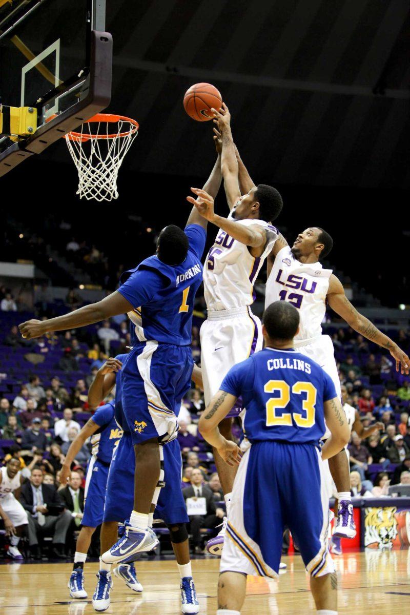 LSU freshman forward Dennis Harris reaches for the ball Jan. 4 against McNeese State. Harris will play Thursday against Tennessee.