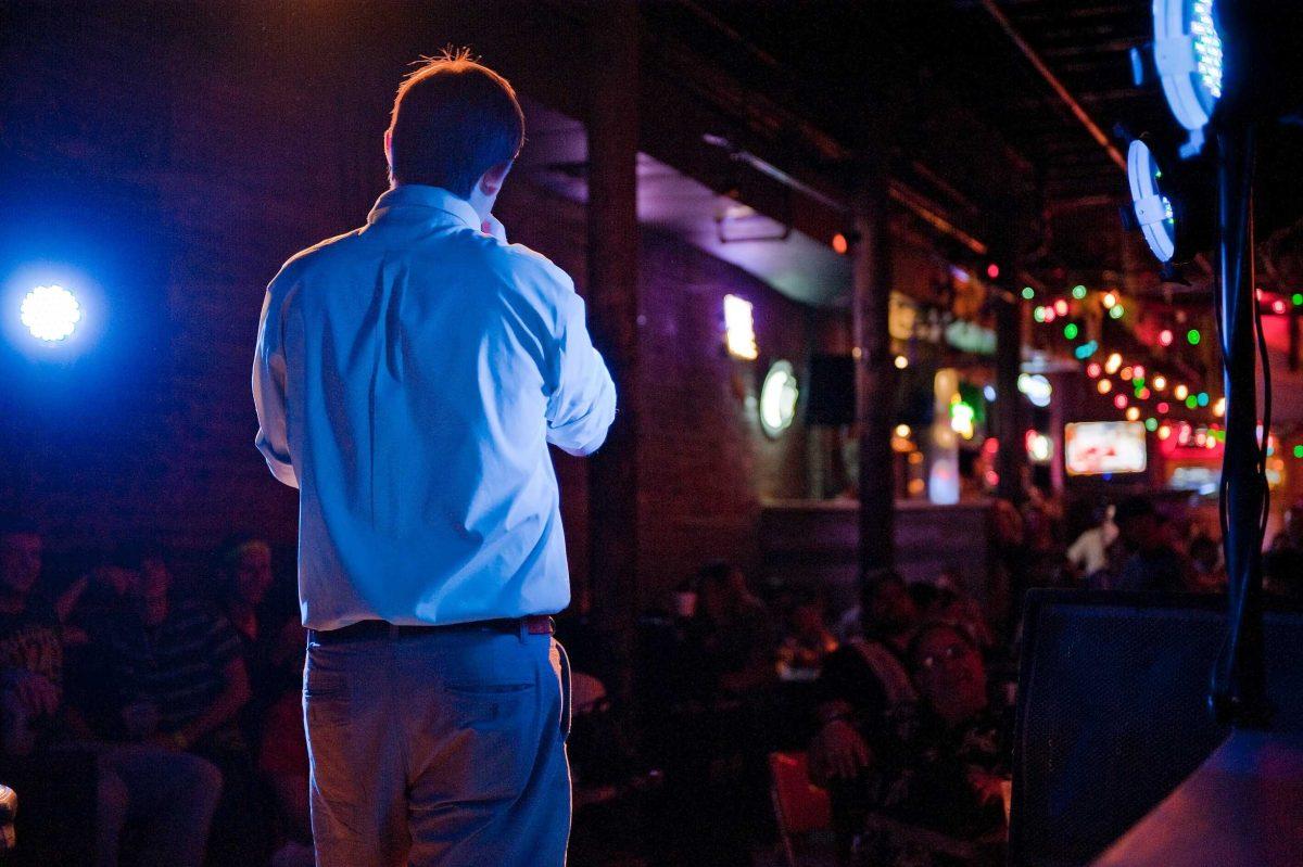 Comedian Joe Barber makes the crowd laugh out loud Tuesday at Boudreaux &amp; Thibodeaux&#8217;s as he talks about what Brad Pitt would have to do to be unattractive.