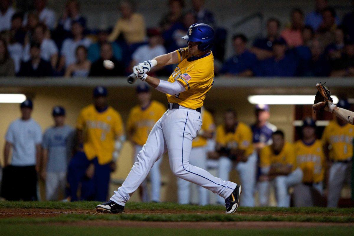 LSU senior first baseman Blake Dean hits a homerun April 16 during the Tigers&#8217; 12-5 victory against Alabama at Alex Box Stadium.