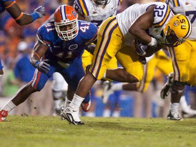 Running back Charles Scott (32) breaks free from a defender Oct. 10 in LSU&#8217;s loss to Florida in Tiger Stadium.