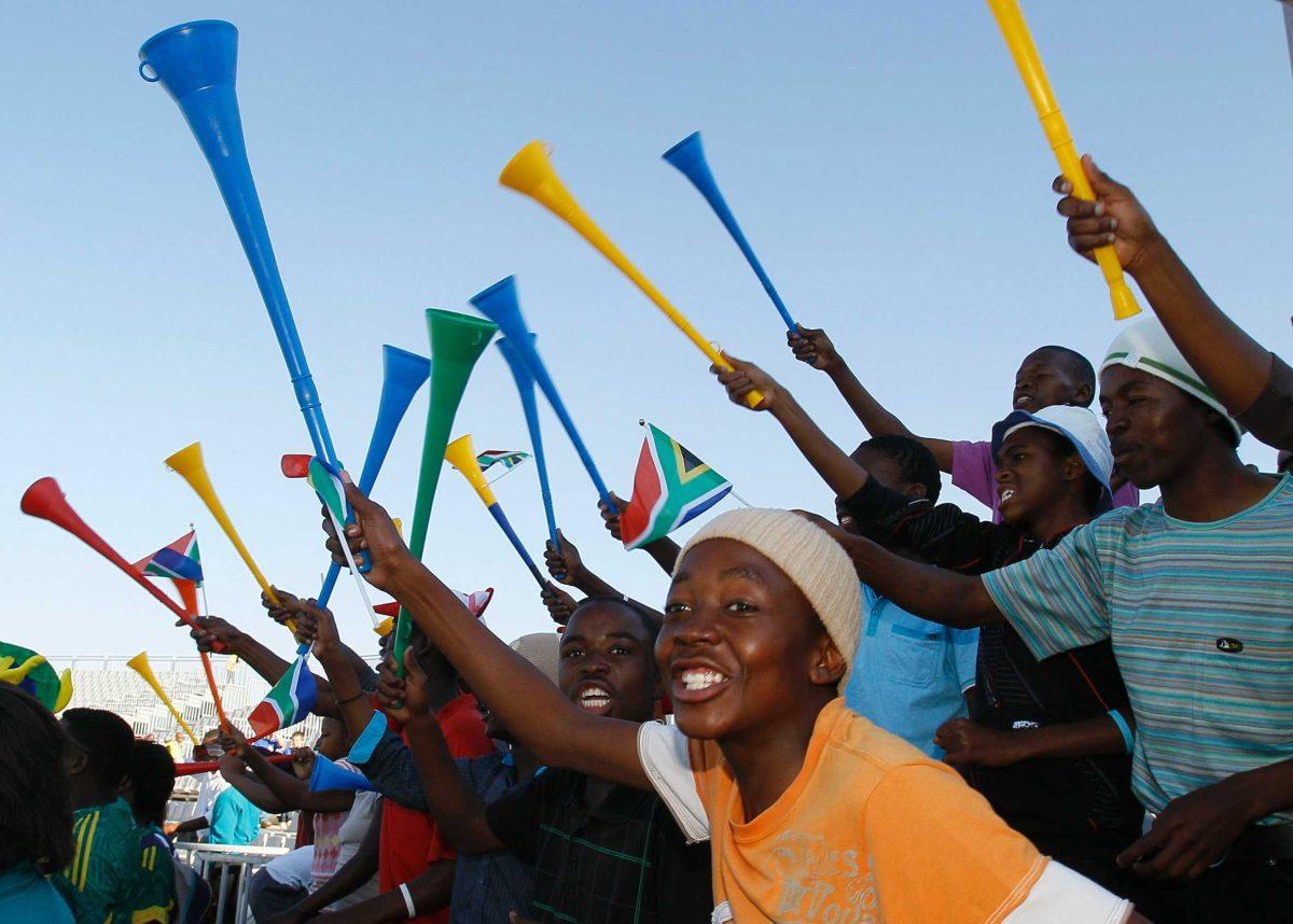 Fans cheer ahead of England&#8217;s training match against Platinum Stars at Moruleng Stadium on Monday in Lesetlheng, South Africa. England is preparing for the upcoming World Cup.