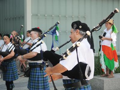 Members of Na Cait Dubh play classic Irish music Saturday in front of the Shaw Center for the Arts during the second annual Irish Film Festival.