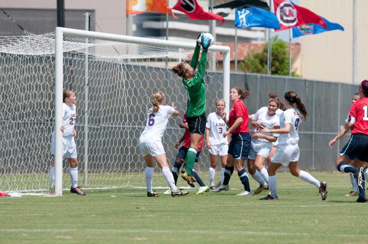 LSU junior Mo Isom (0) makes a save against the University of South Alabama. The Lady Tigers shut out the Jaguars 8-0 on Aug. 22 at the LSU Soccer Complex. They will travel to face three-time defending Conference USA champion Memphis on Saturday.