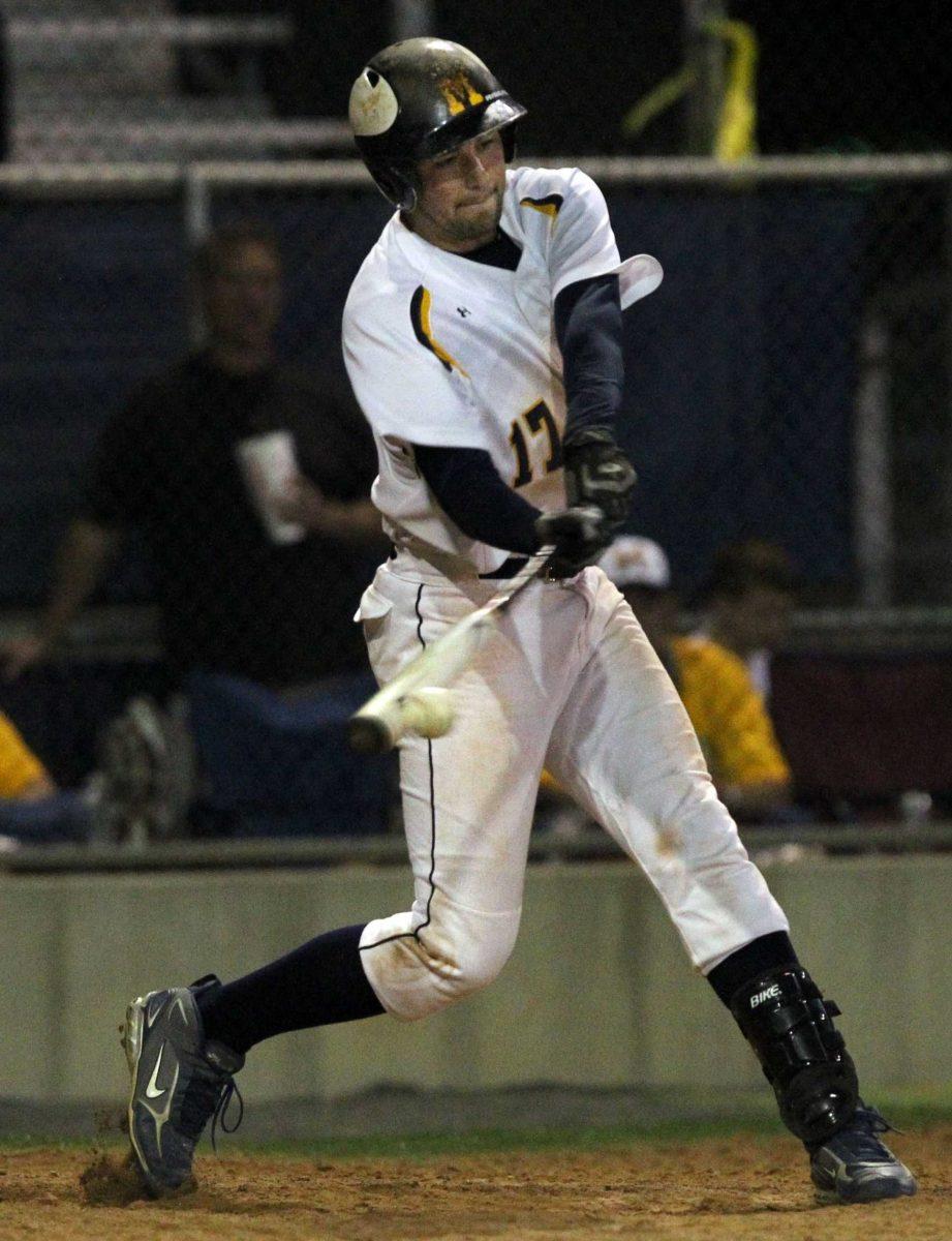 McKinney High&#8217;s Zach Lee, 17, connects with a ball during high school baseball action between McKinney North High School and McKinney High School on April 16, 2010.