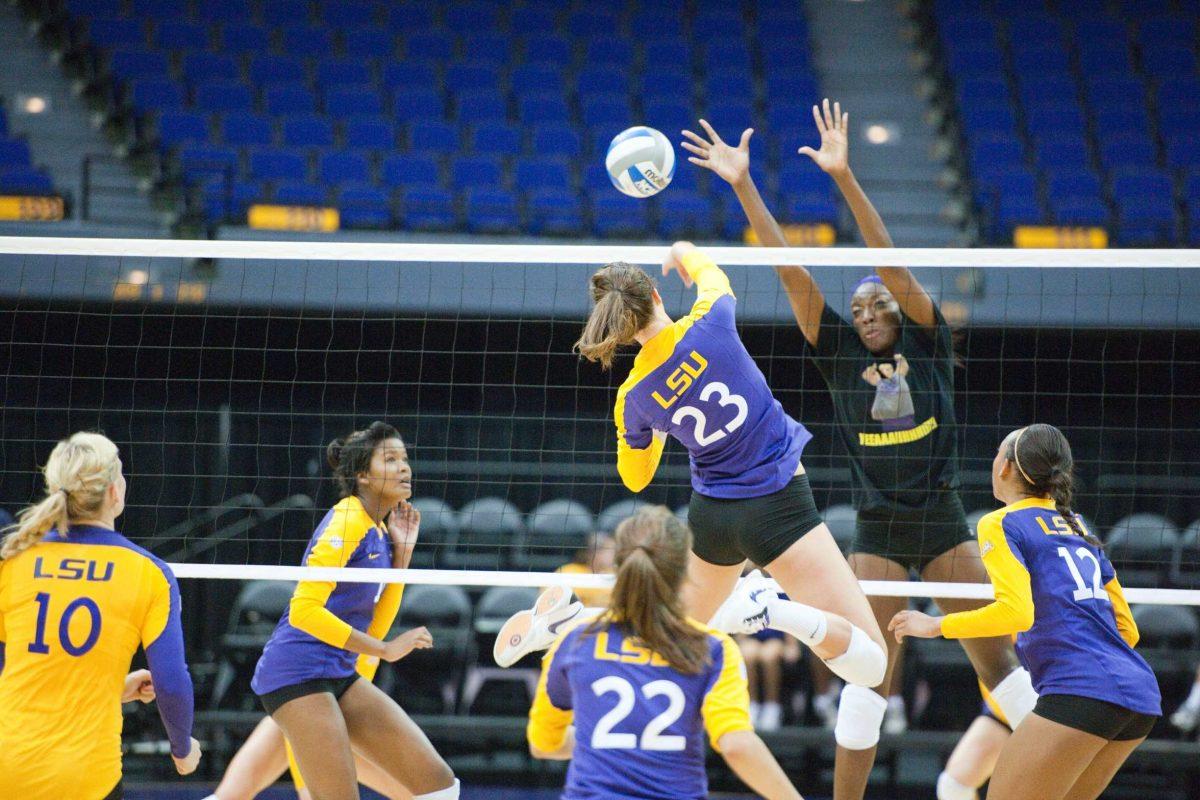 Junior middle blocker Michele Williams spikes the ball during a scrimmage in the PMAC on Aug. 21. The Tigers swept the Texas A&amp;M Invitational in College Station, Texas, wwlast weekend, and Williams was named tournament MVP.