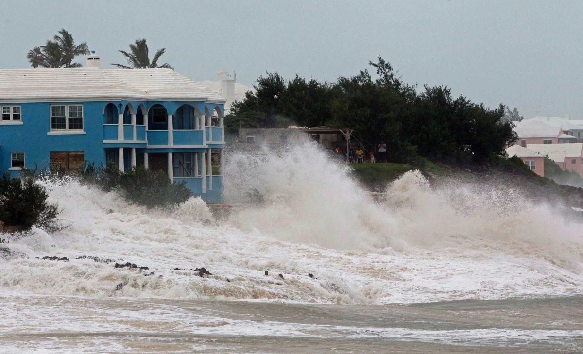 Waves crash onto the beach at John Smith&#8217;s Bay in Smith&#8217;s Parish as Hurricane Igor approaches in Bermuda, Saturday, Sept. 18, 2010.