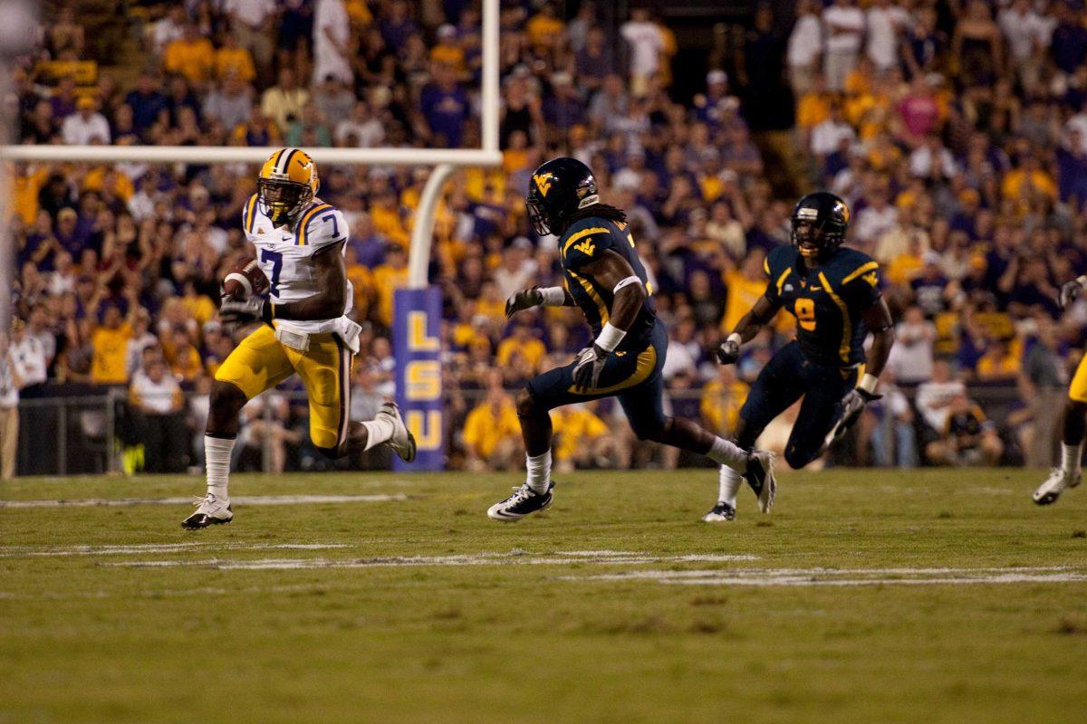 LSU junior cornerback Patrick Peterson returns a punt Saturday during the first quarter of the Tigers&#8217; 20-13 victory against West Virginia in Tiger Stadium.