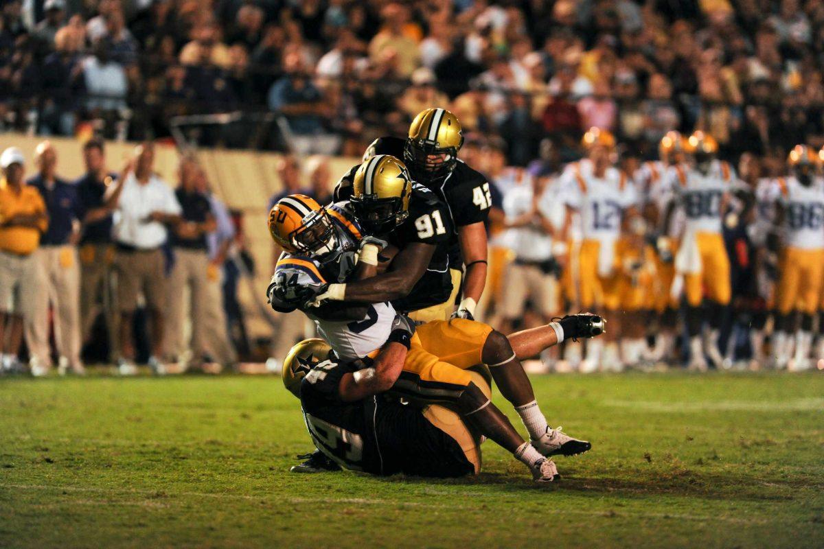 LSU junior running back Stevan Ridley (34) is brought down Saturday by Vanderbilt&#8217;s defense during the Tigers&#8217; 27-3 victory against the Commodores in Nashville, Tenn.