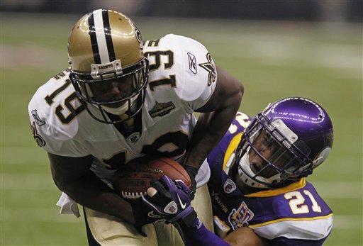 New Orleans receiver Devery Henderson (19) scores a touchdown Thursday as Vikings&#8217; Asher Allen (21) defends during the Saints&#8217; 14-9 win against Minnesota.