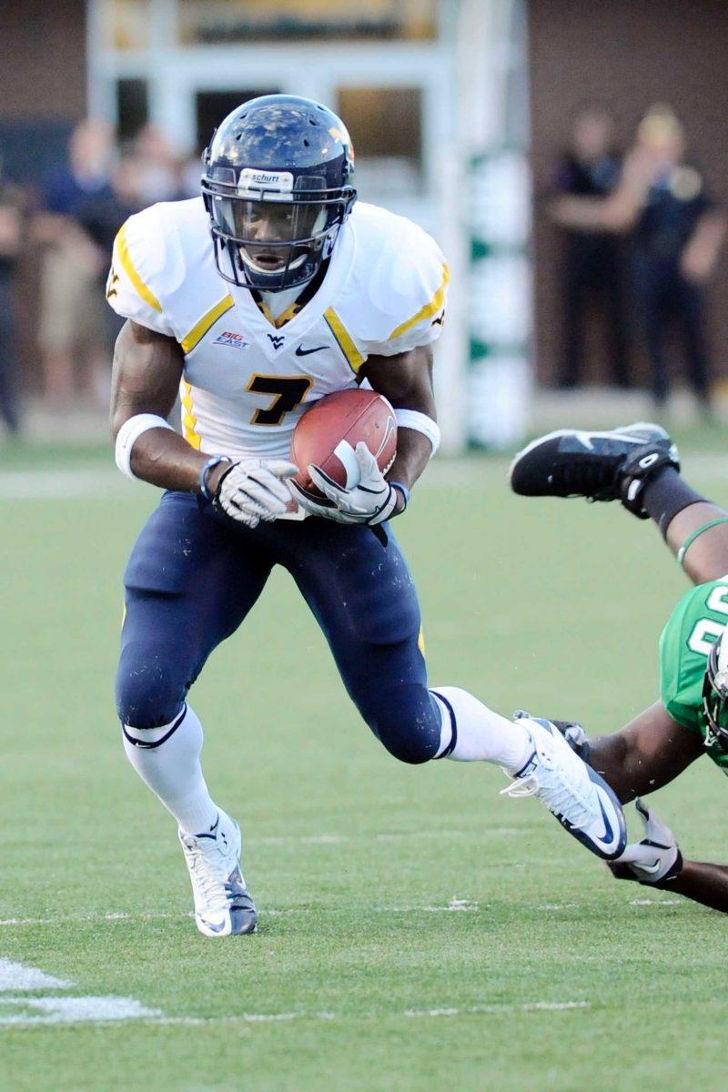 West Virginia Running back Noel Devine breaks a tackle Sept. 10 during WVU&#8217;s 24-21 win against Marshall in Huntington, W.Va.