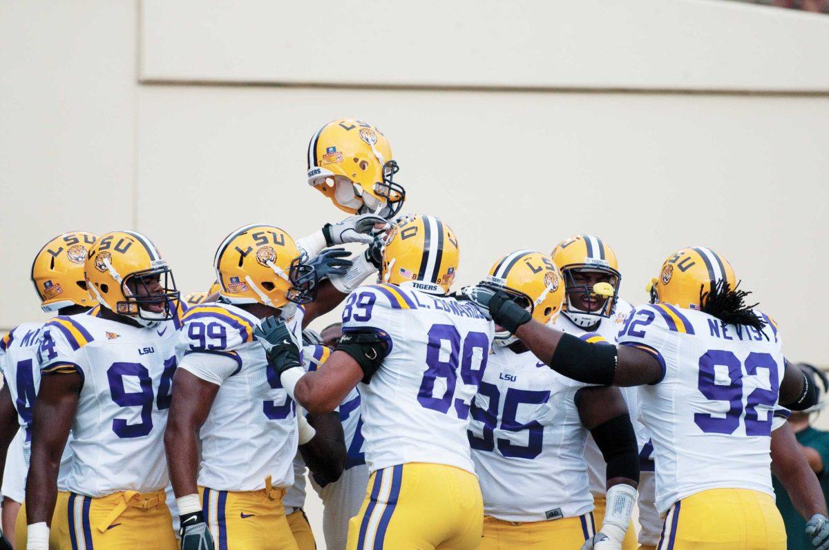 LSU&#8217;s defensive line huddles up Sept. 11 before the Tigers&#8217; 27-3 win against Vanderbilt. The Tigers will host Mississippi State on Saturday for the annual Gold Game.