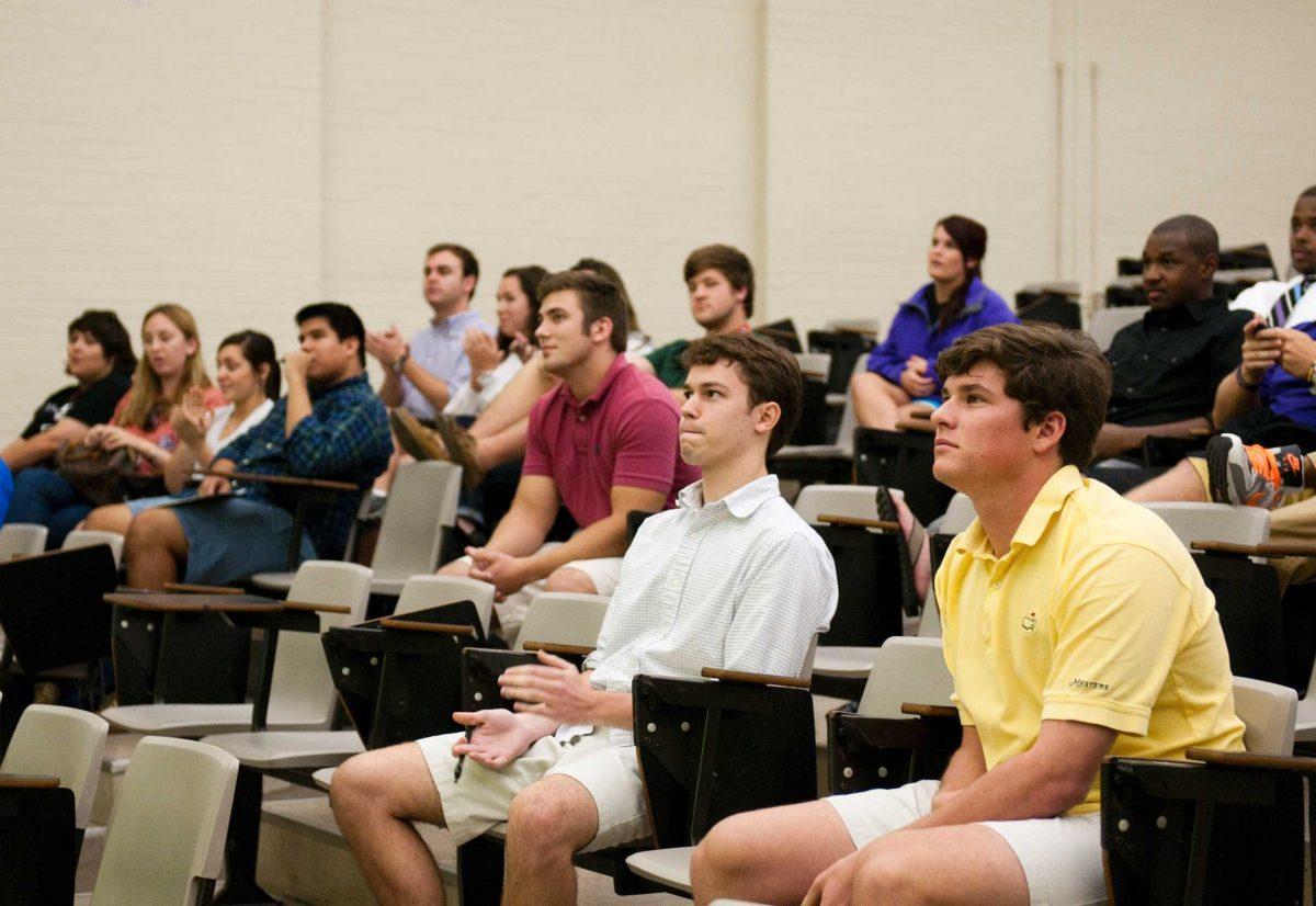 Justin Terracciano, biology sophomore, left, and Harrison Breaud, finance sophomore, right, wait for results of the fall SG elections on Wednesday night.