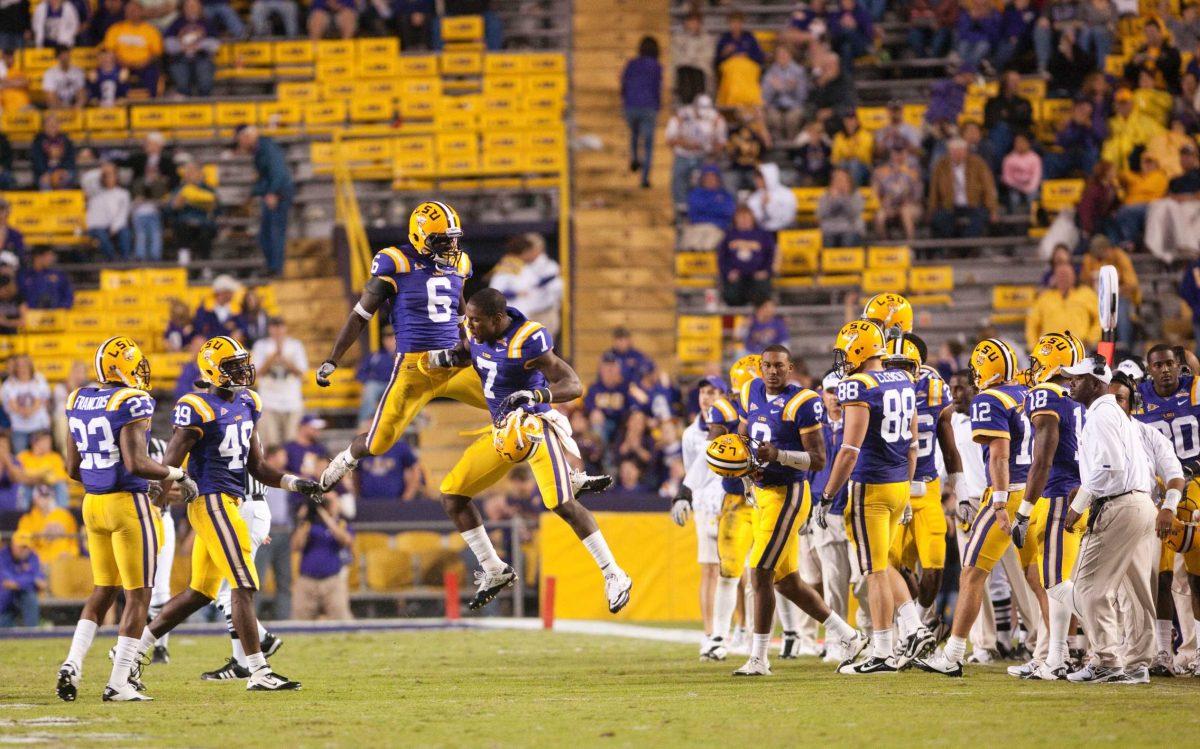 LSU redshirt freshman safety Craig Loston (6) and junior cornerback Patrick Peterson (7) celebrate Saturday during LSU&#8217;s win.