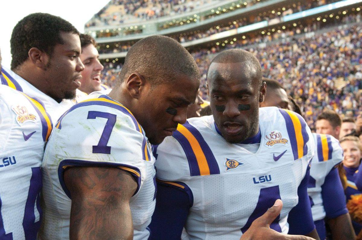 LSU senior safety Jai Eugene talks to junior cornerback Patrick Peterson (7) on Nov. 6 after the Tigers&#8217; 24-21 win against Alabama.