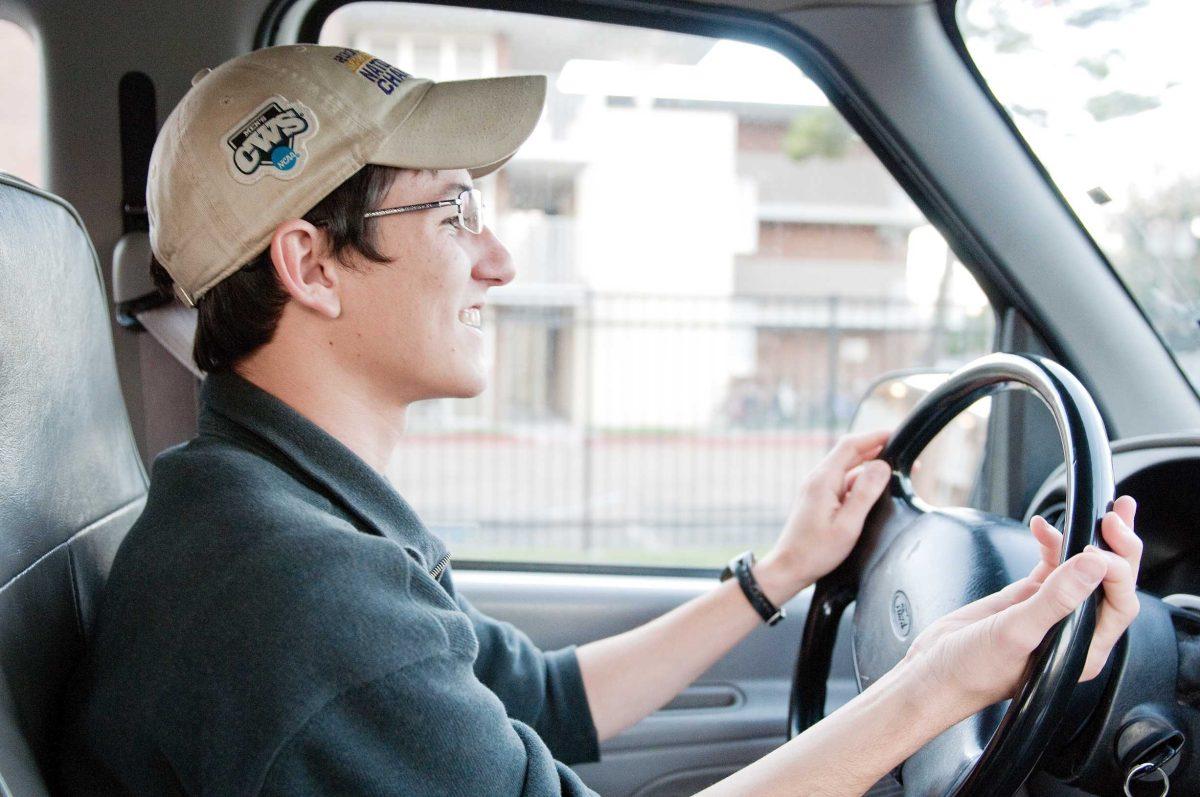 Ira Alves, biological sciences junior, drives a Campus Transit van Thursday.