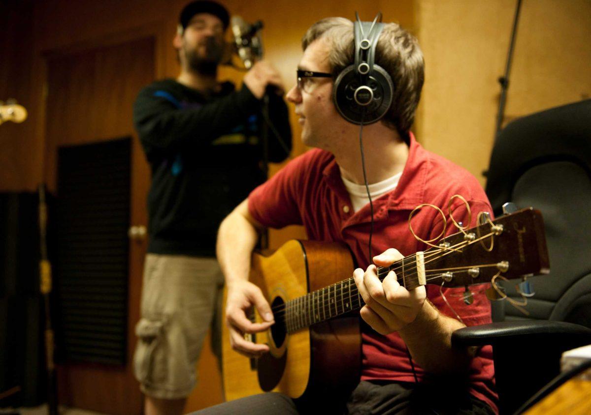 David Achee, from Toothknife, records a guitar track Tuesday at Tipitina&#8217;s. Tipitina&#8217;s gives local musicians a place to practice and record music and learn how to use new digital media.