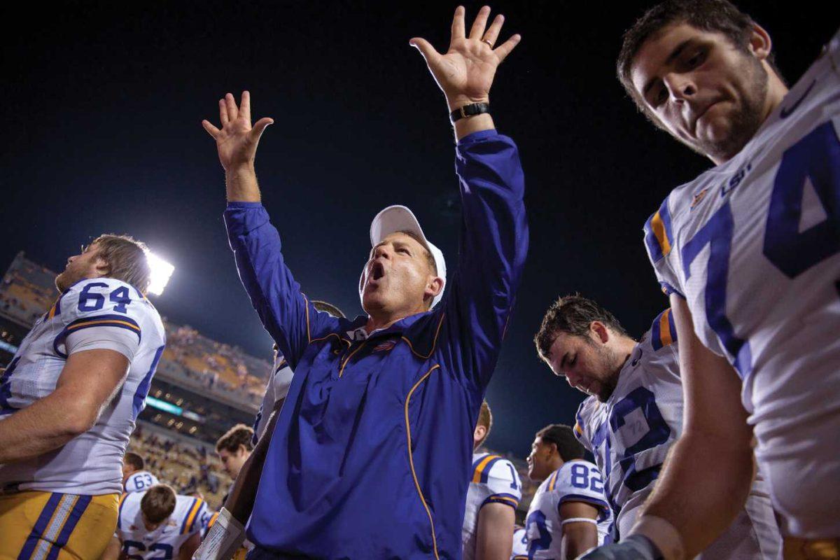 LSU football coach Les Miles celebrates after the Tigers&#8217; 20-14 win over West Virginia on Sept. 25. Miles is ready to get back on the field Saturday when the Tigers take on No. 6 Alabama.