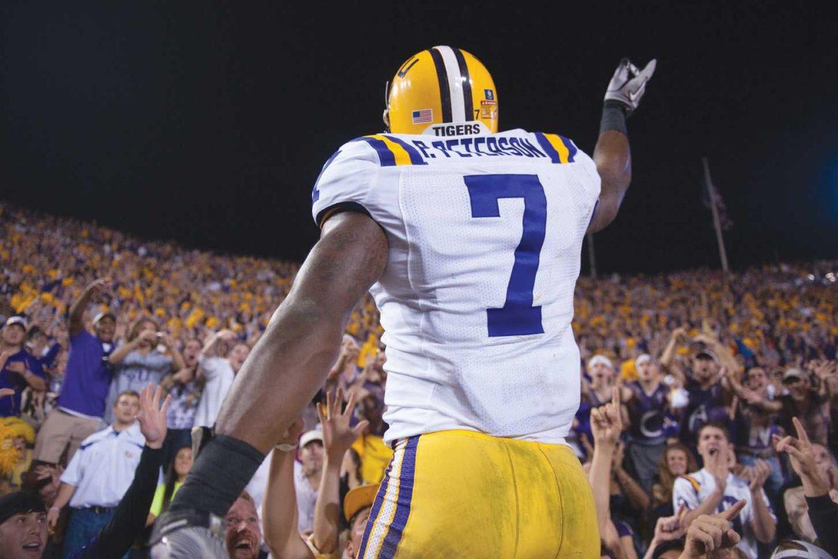 LSU junior cornerback Patrick Peterson pumps up the crowd Nov. 20 after the Tigers&#8217; 43-36 win against Ole Miss in Tiger Stadium.