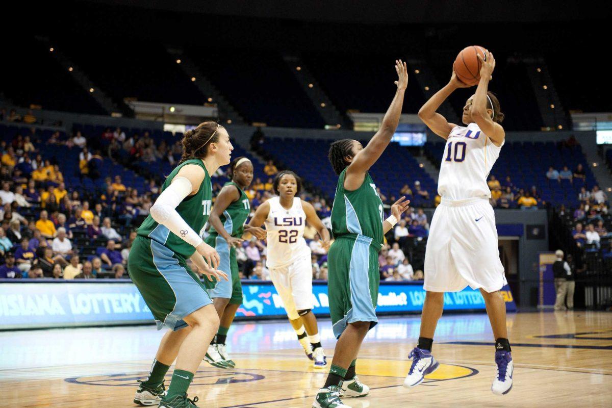 LSU sophomore guard Adrienne Webb (10) shoots over a Tulane d