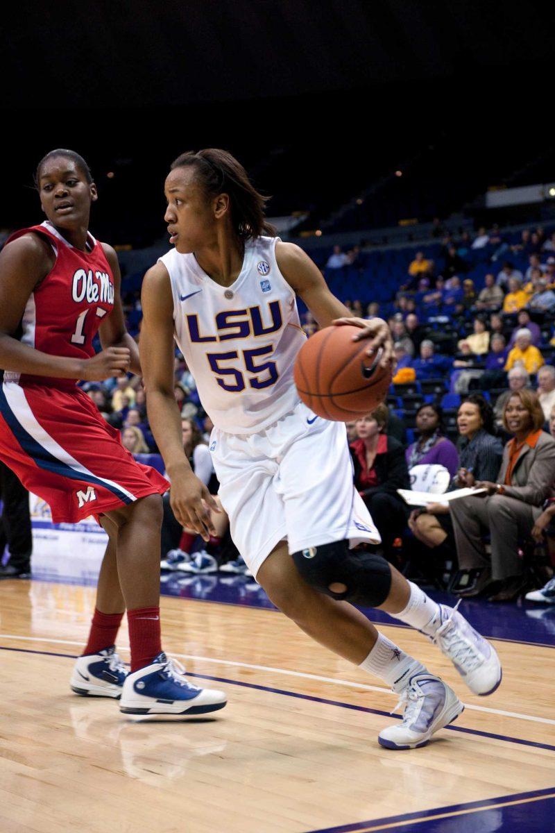 LSU junior forward LaSondra Barrett drives past a Rebel defender Thursday night during the Tigers&#8217; win against Ole Miss in the PMAC. Barrett scored 19 points, leading the Tigers to a 78-43 victory.