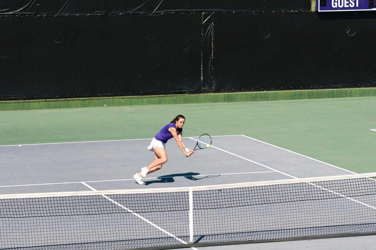 LSU sophomore, Kaitlin Burns, returns a shot against Oklahoma State University. The Lady Tigers lost, 5-2, to the Cowgirls.