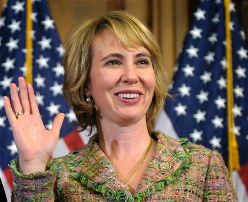 In this Jan. 5, 2011 file photo, Rep. Gabrielle Giffords, D-Ariz., takes part in a reenactment of her swearing-in, on Capitol Hill in Washington. Experts say recovery for Giffords will be a long, tough journey. Patients can make remarkable progress. But experts caution that they shouldn't expect to return to exactly the way they were before, and it&#8217;s too early to know if Giffords might be able to return to Congress.