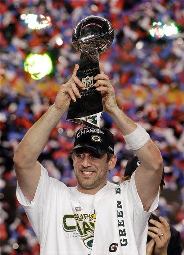 Green Bay Packers' Aaron Rodgers poses with the Vince Lombardi Trophy after the NFL Super Bowl XLV football game against the Pittsburgh Steelers Sunday, Feb. 6, 2011, in Arlington, Texas. The Packers won the game 31-25.