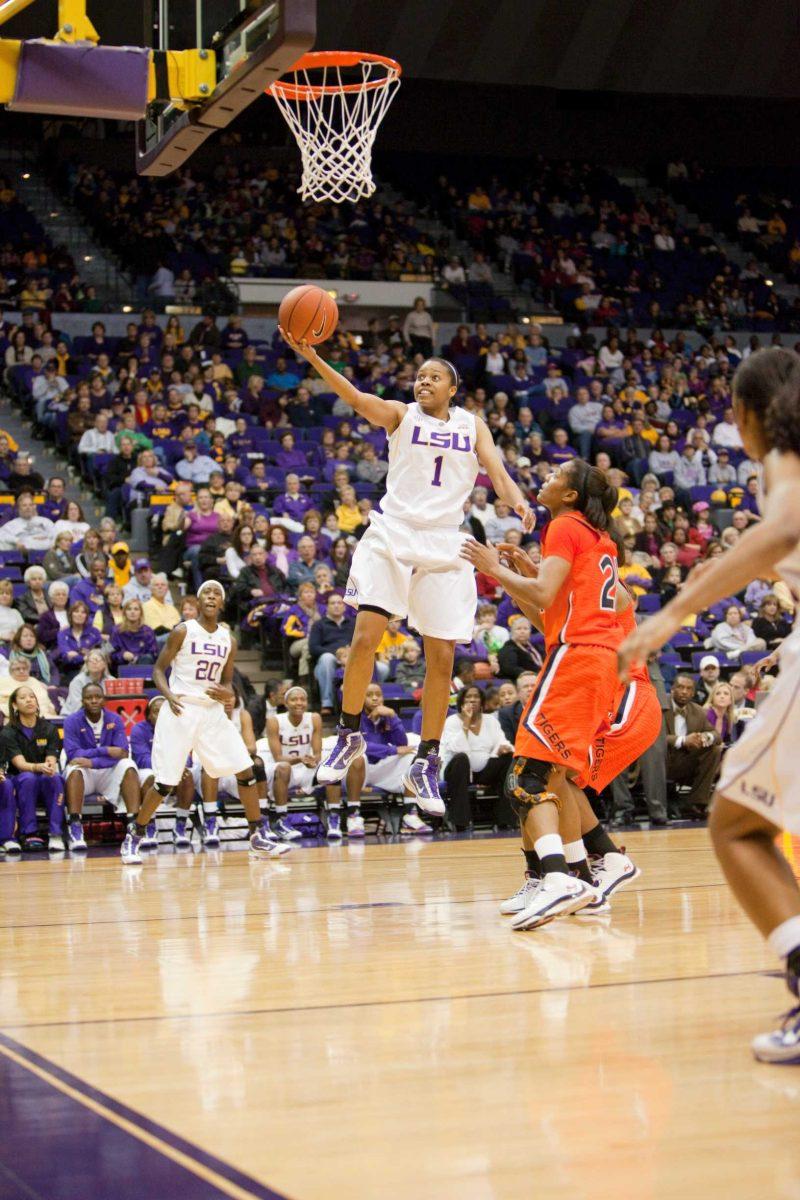 Senior guard Latear Eason (left) drives for a layup Dec. 16, 2009 in a 75-33 win against North Carolina A&amp;T.