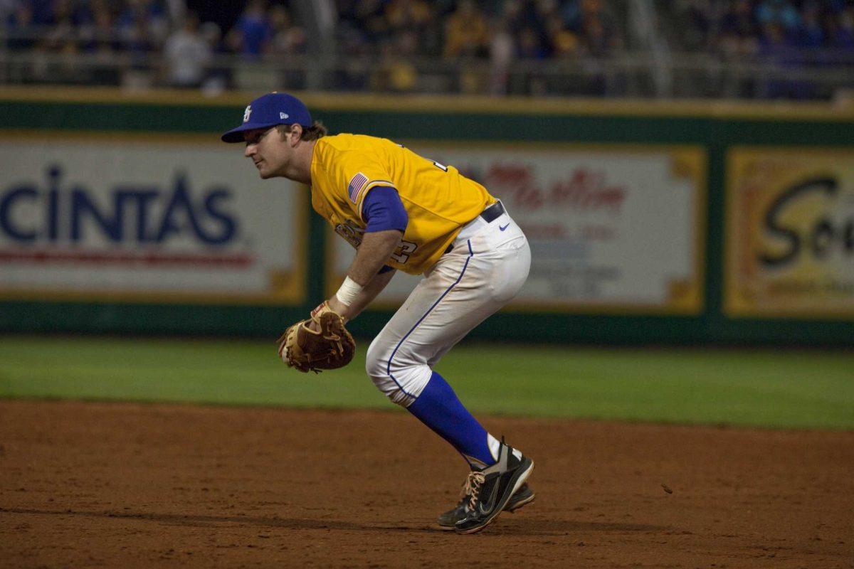 Sophomore first baseman Alex Edward anticipates a ground ball Friday in LSU&#8217;s 12-3 win against Holy Cross in Alex Box Stadium.