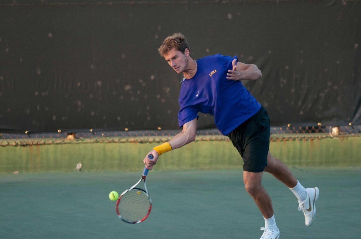 Junior Mark Bowtell hits a forehand Feb. 8 against Louisiana-Lafayette.