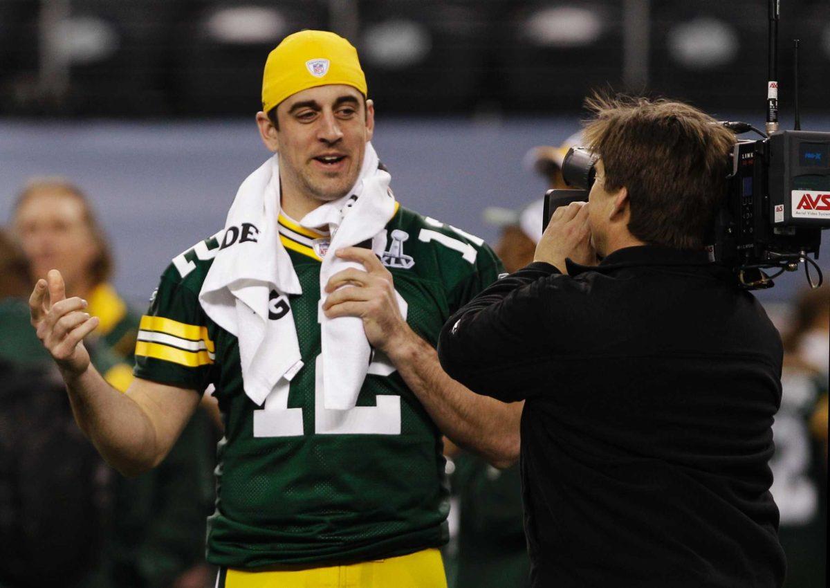 Green Bay Packers quarterback Aaron Rodgers is interviewed Tuesday during media day for NFL Super Bowl XLV. Many LSU students hope to see Rodgers win his first title.