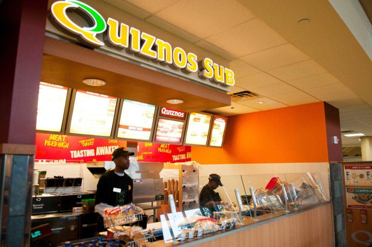 Employees prepare sandwiches Monday at the newly opened Quiznos in the Student Union Tiger Lair. More dining options are expected to open in coming weeks.