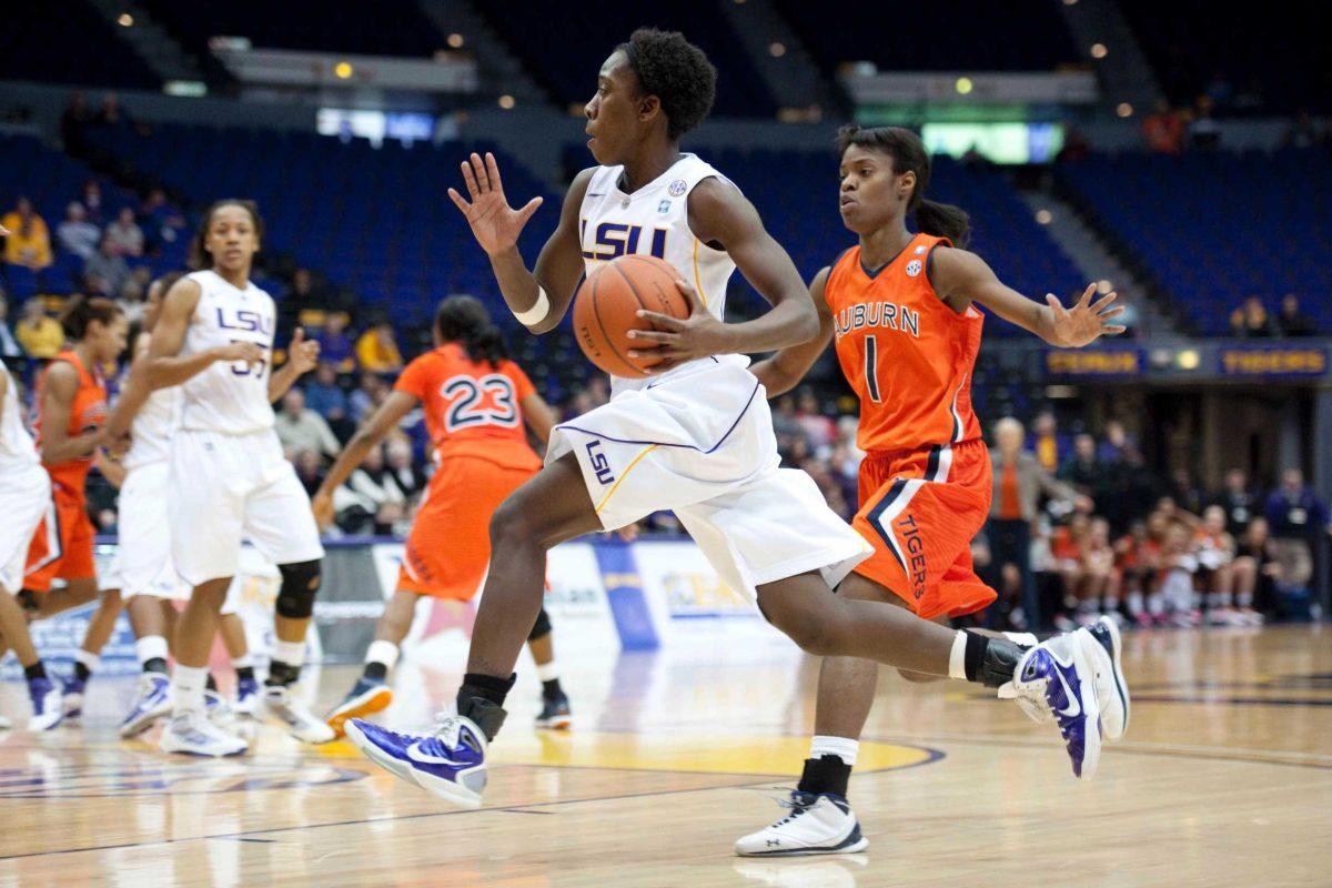 LSU junior guard Destini Hughes dribbles down the court in the Lady Tigers&#8217; game against Auburn in the PMAC earlier this season. LSU beat Auburn, 55-52.