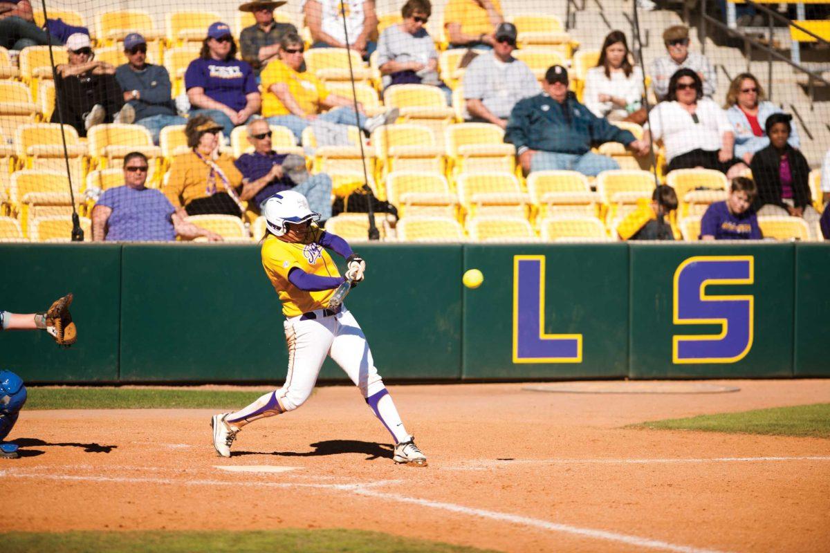 LSU junior Juliana Santos (2) takes a swing Feb. 13 at the Tiger Classic against LA Tech. The Tigers beat the Lady Techsters 10-2.