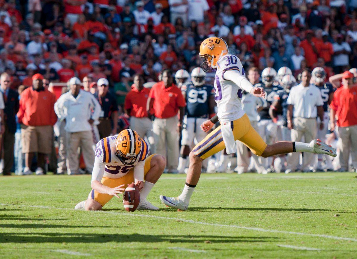 Josh Jasper (30) kicks a field goal Oct. 23 against Auburn. Jasper's position will be filled by junior Drew Alleman, his backup kicker, in the fall. Alleman could also be the punter, along with redshirt freshman Brad Wing and senior DJ Howard.