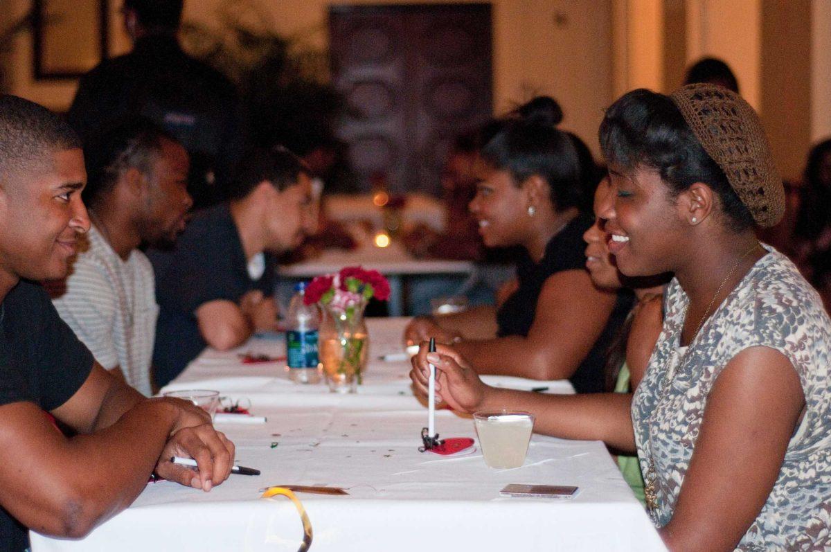 Students mingle Monday night at Delta Sigma Theta sorority's speed dating event "First Round Draft Pick" at the University's Faculty Club.