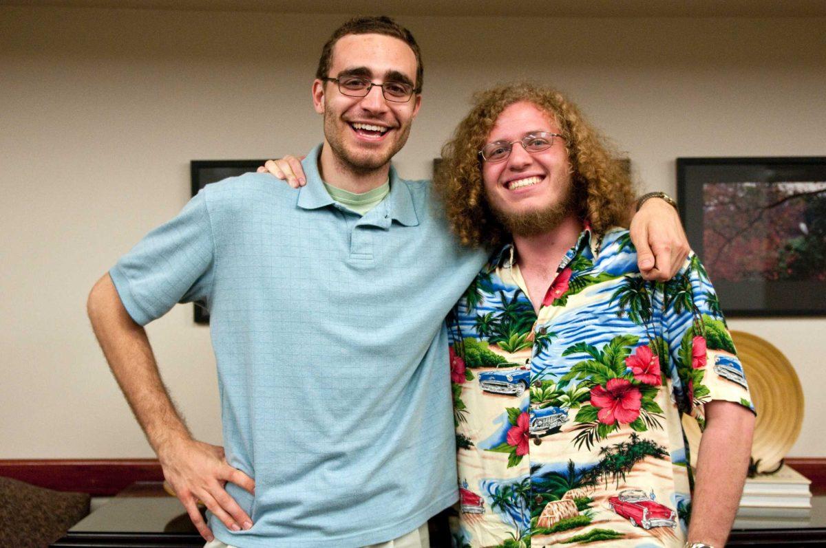 SG vice presidential candidate Jarrett Richard, left, and presidential candidate Garrett Dupre discuss their campaign Monday in Hodges Hall.