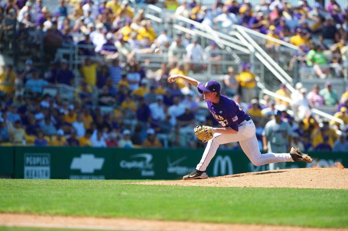 LSU freshman pitcher Ryan Eades throws a pitch Sunday. The Gators swept the Tigers at home this weekend in an SEC series &#8212; a first for LSU since 2006.