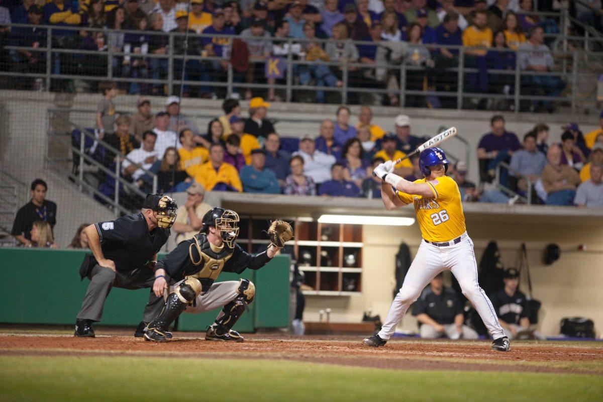 LSU freshman catcher Ty Ross eyes a pitch Feb. 18 during the Tigers&#8217; 15-4 win against Wake Forest at Alex Box Stadium. Ross replaced former Tiger Micah Gibbs at catcher.