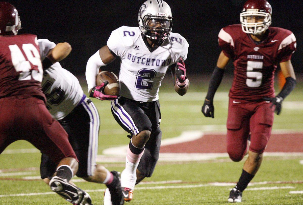 Dutchtown&#8217;s Landon Collins (2) navigates traffic as Destrehan High School defends Friday, Oct. 8, 2010. Collins led Dutchtown to an undeafeted regular season.